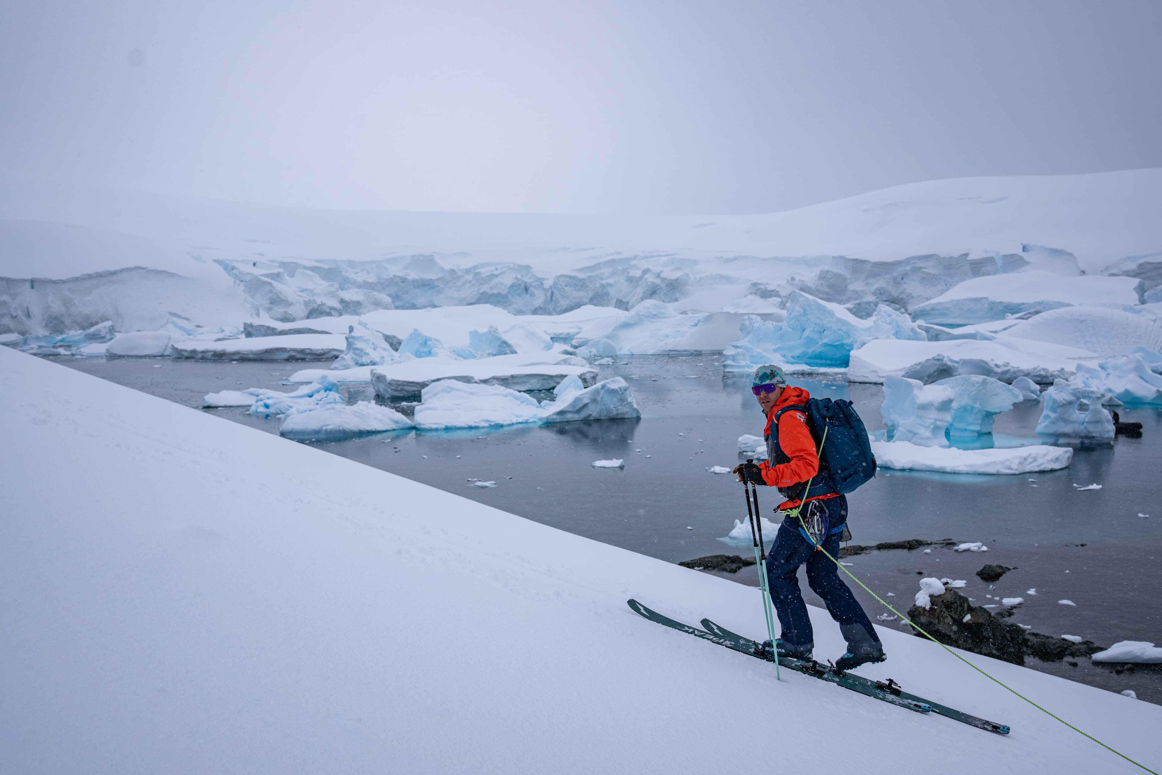 Skinning alongside icebergs in Antarctica